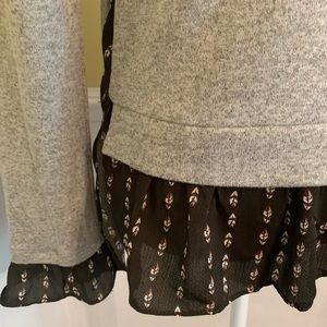 Sweater with ruffle waist and wrists